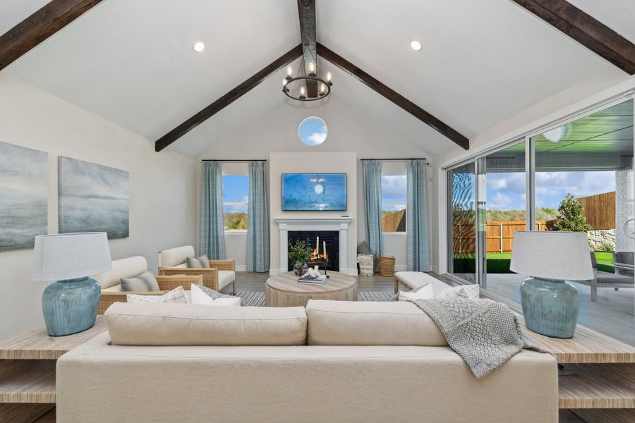 Great room with vaulted ceiling and stained ceiling beams