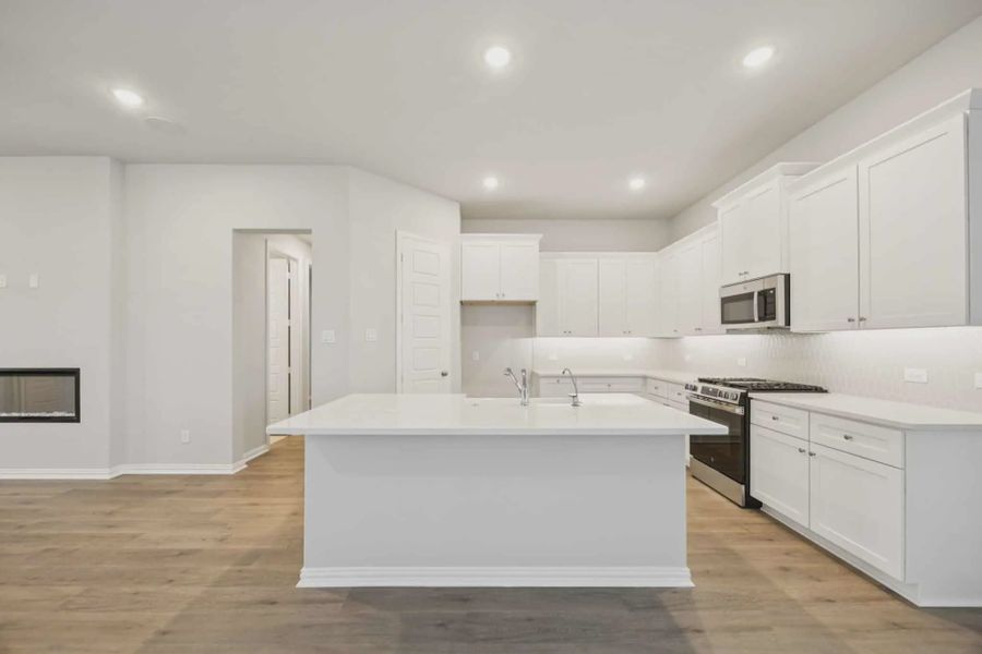 Representative furnished interior of a home built from the Sacramento by Chesmar Homes in Summer Crest, Crowley (Image 5).