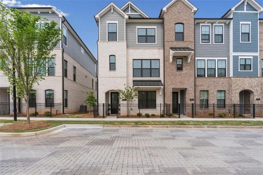 Front exterior of a new home in , Roswell, GA, highlighting curb appeal (Image 2).