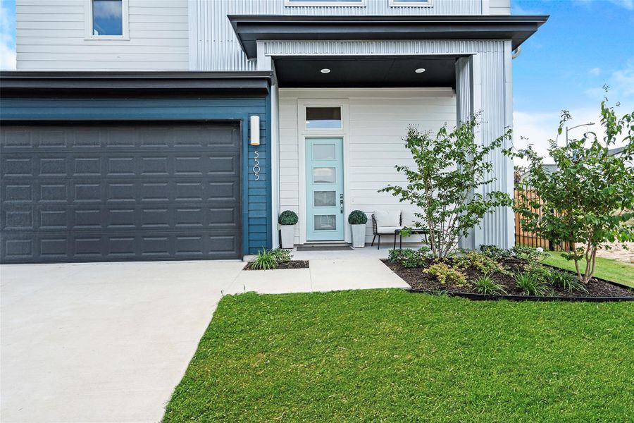 Front exterior of a new home in Agave, Austin, TX, highlighting curb appeal (Image 18).