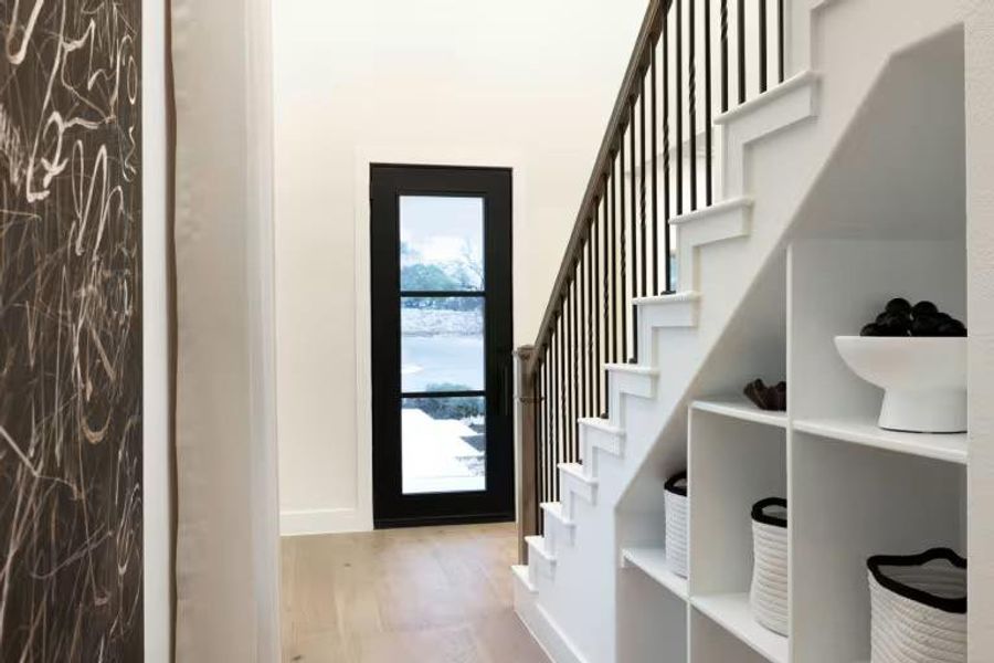 Photo of Pulte model home with same floor plan, not of actual home listed.