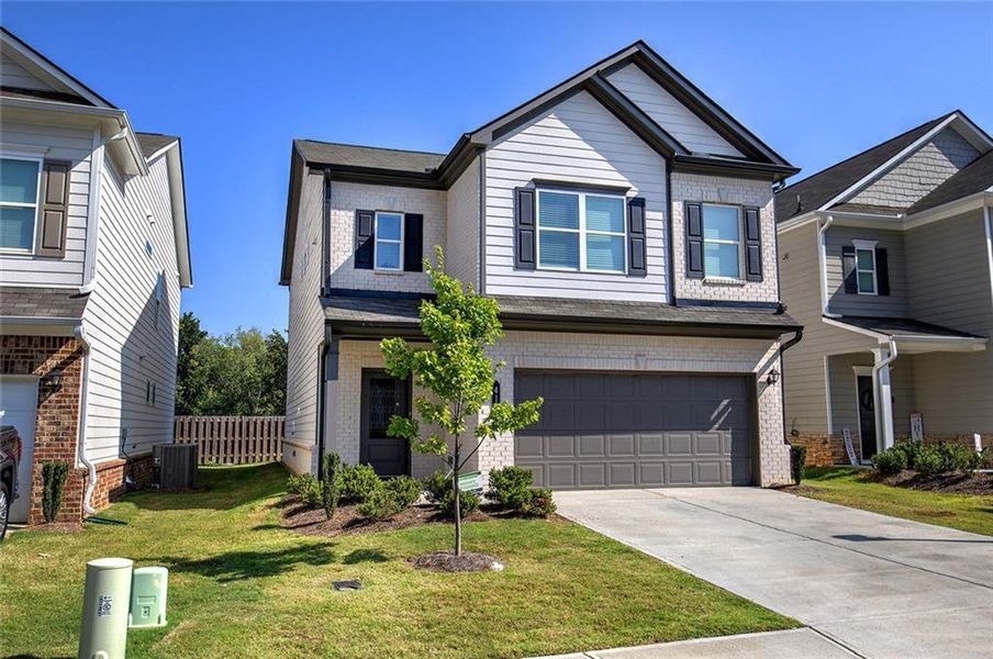 Front exterior of a new home in , Cartersville, GA, highlighting curb appeal (Image 18).