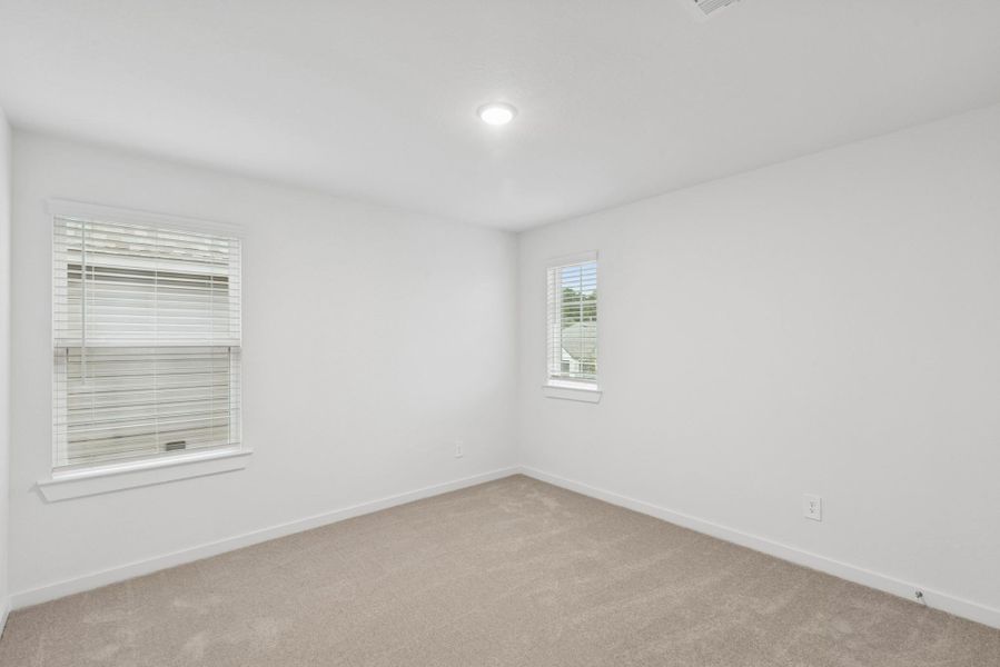 Spacious, unfurnished interior of a new home in Sorella, Tomball (Image 17).