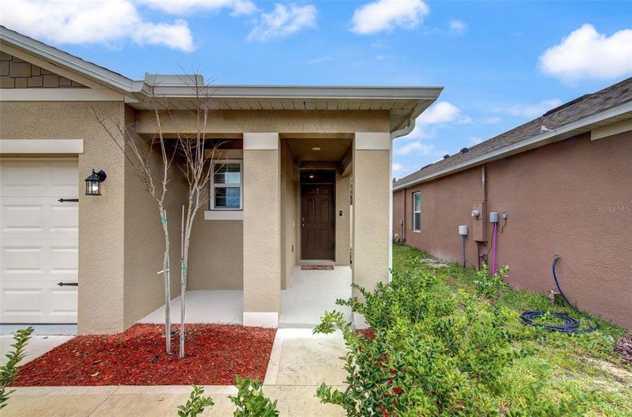 Exterior details and patio area of a home in Cadence at Parc Hill, Orange City (Image 2). Exterior details and patio area of a home in Cadence at Parc Hill, Orange City (Image 2).