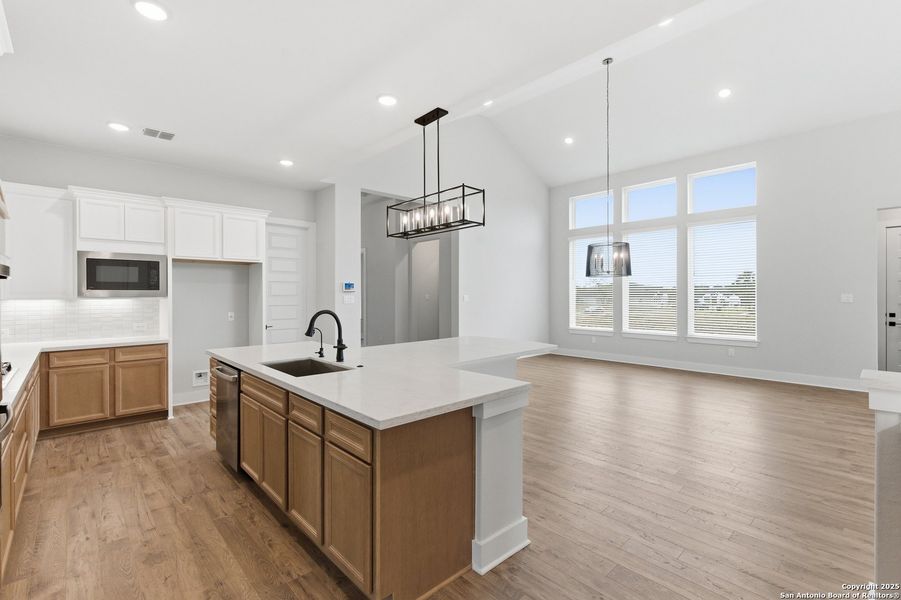 Furnished interior view inside a new home in Potranco Oaks, Castroville (Image 14).