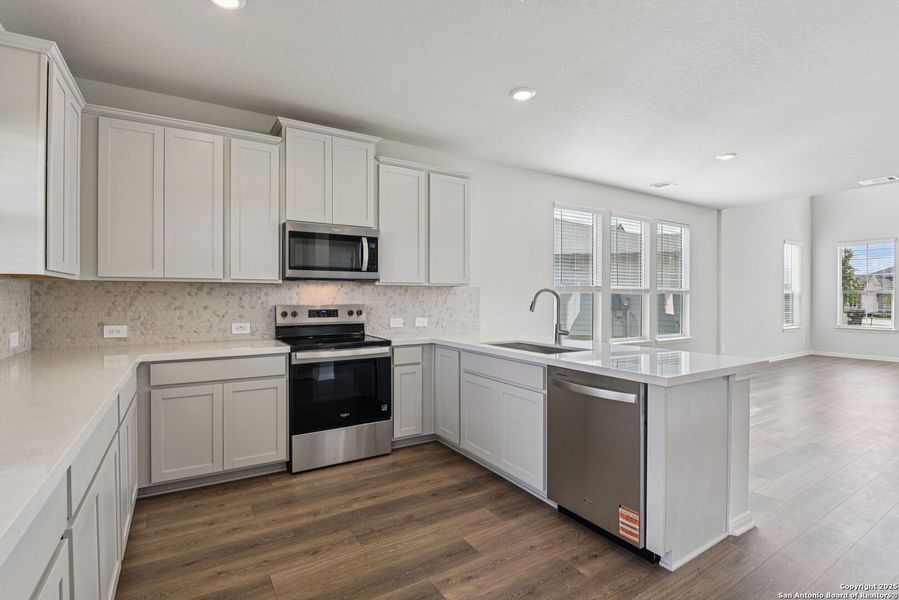 Furnished interior view inside a new home in Estancia Ranch - Premier Series, San Antonio (Image 13). Furnished interior view inside a new home in Estancia Ranch - Premier Series, San Antonio (Image 13).