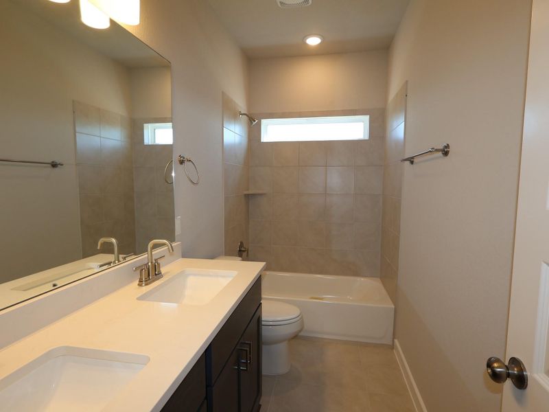 Furnished interior view inside a new home in Cedar Brook, Leander (Image 7).