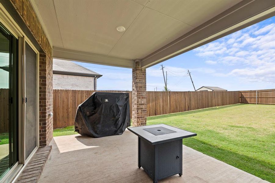 Exterior details and patio area of a home in Stonehaven, Seagoville (Image 25).