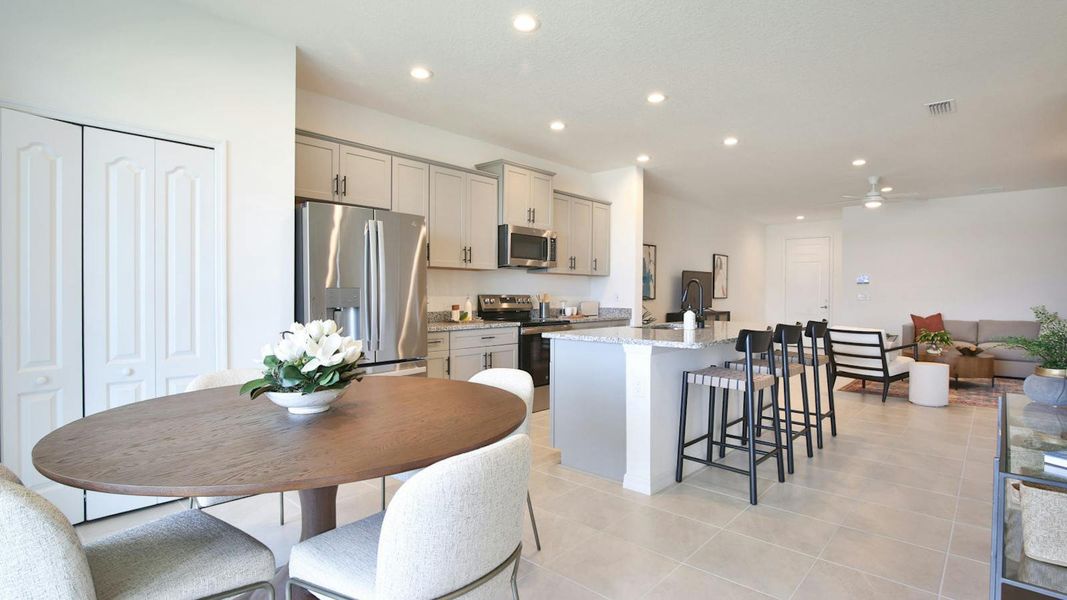 Furnished interior view inside a new home in Palm Grove Real Estate and Homes for Sale in Lakewood Ranch, FL - Neal Communities, Lakewood Ranch (Image 20).
