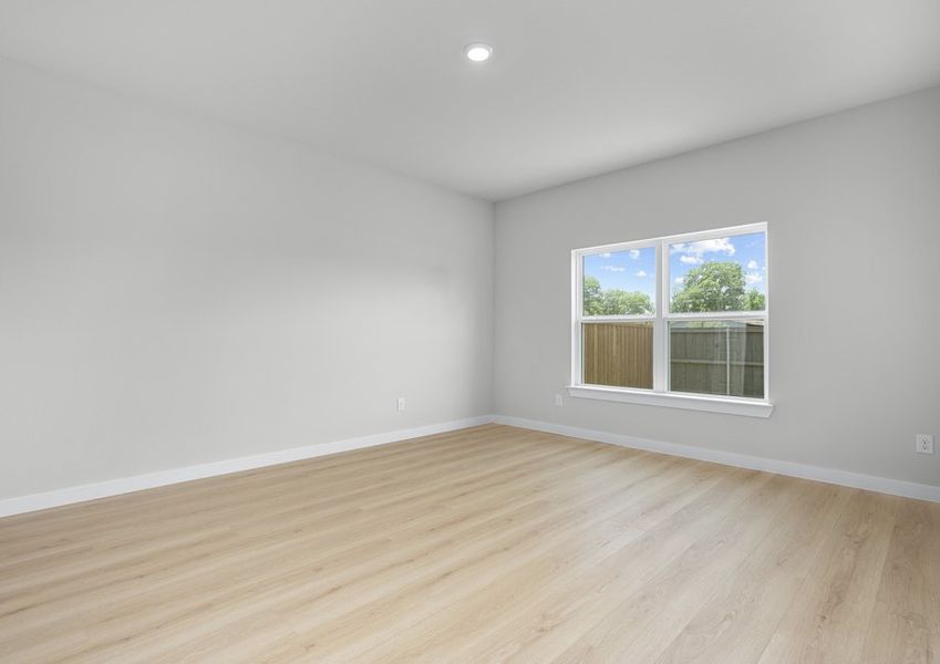 Master suite with a large window