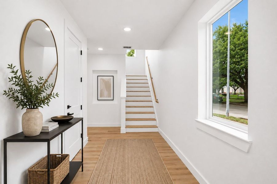 Foyer. Photo is virtually staged.