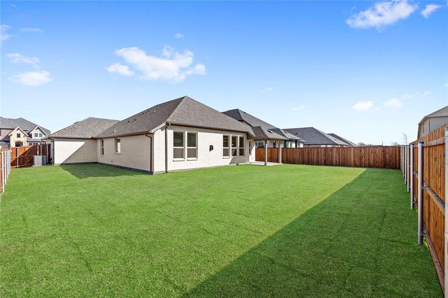 Exterior details and patio area of a home in Brookville Estates, Forney (Image 4).
