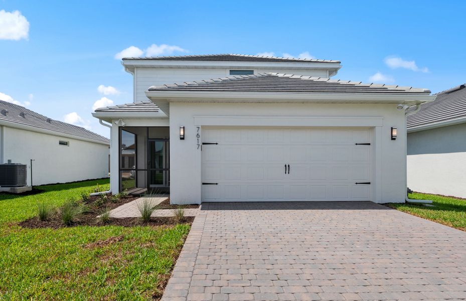 Representative exterior photo of a completed home built from the Mabel II by Pulte Homes in SeaFlower, Bradenton, FL (Image 30). Representative exterior photo of a completed home built from the Mabel II by Pulte Homes in SeaFlower, Bradenton, FL (Image 30).