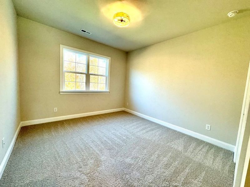 2 story home with a first floor main bedroom