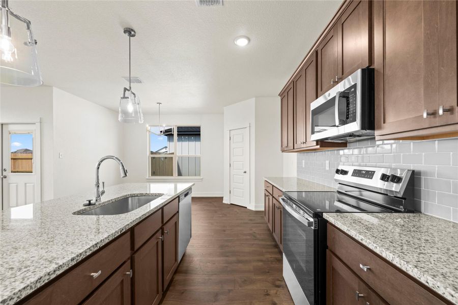 Please Note: These interior photos are not of the actual design but are of a completed home wiht a similar floor plan. Finishes, features, and layouts may vary. Please Note: These interior photos are not of the actual design but are of a completed home wiht a similar floor plan. Finishes, features, and layouts may vary.