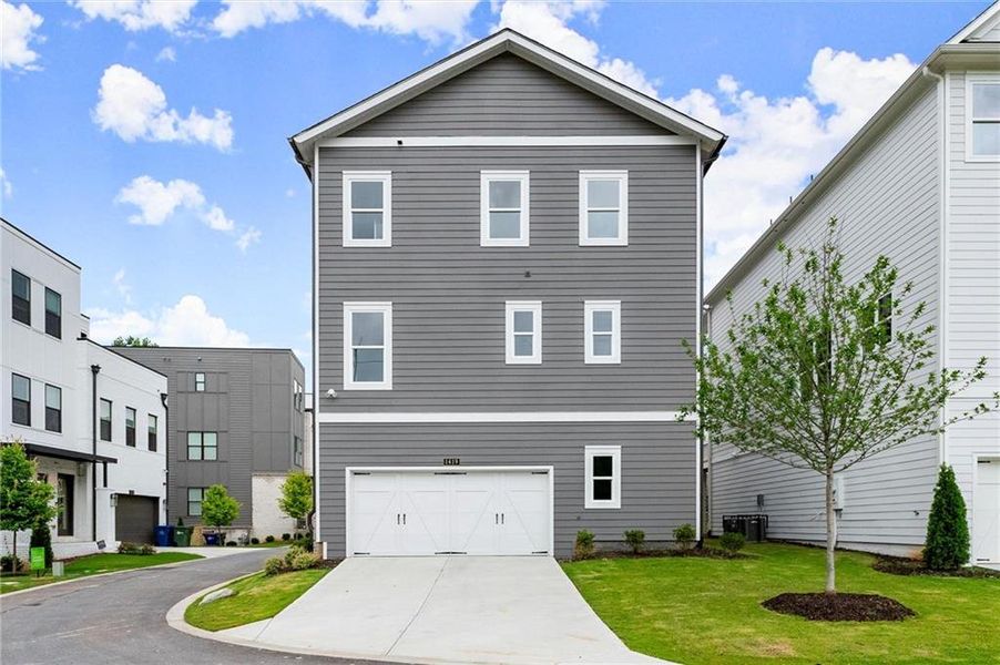 Front exterior of a new home in West Town, Atlanta, GA, highlighting curb appeal (Image 2). Front exterior of a new home in West Town, Atlanta, GA, highlighting curb appeal (Image 2).