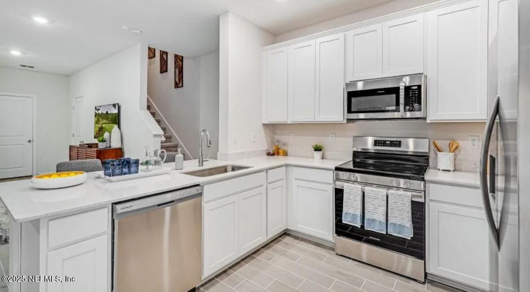 Furnished interior view inside a new home in , St. Augustine (Image 9).