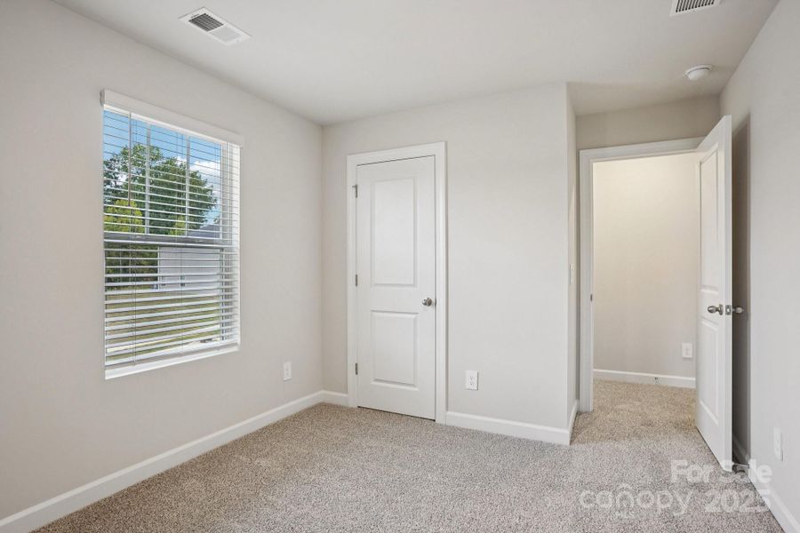 Spacious, unfurnished interior of a new home in Harper Landing, Stanley (Image 16).