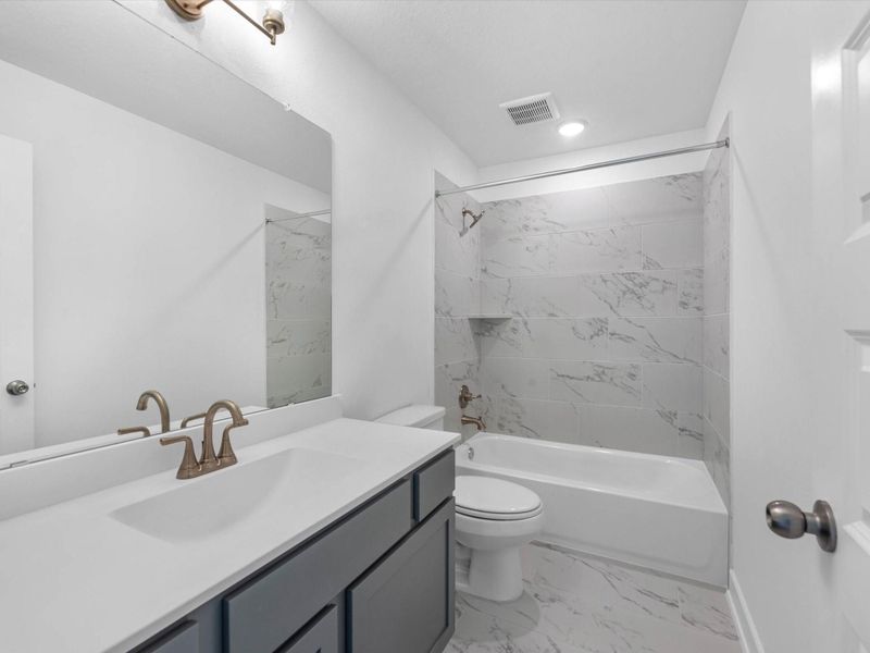 Furnished interior view inside a new home in Meridiana, Manvel (Image 6).