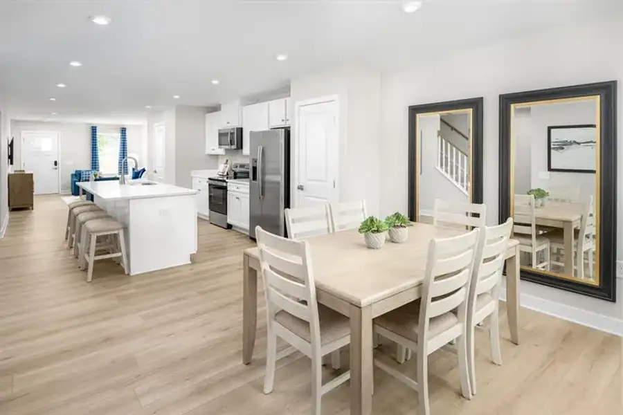 Representative furnished interior of a home built from the Nassau Cove - 3253 Edgehill Drive by Ryan Homes in Lakes at Riverbend, Navassa (Image 6).
