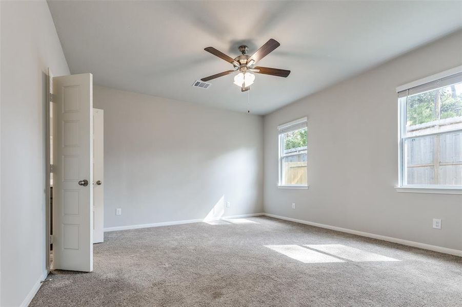 The primary suite features an oversized shower and a large walk-in closet. Designed for comfort, the home includes return vents and ducts in every room.Conveniently located near the kitchen and overlooking the backyard, it offers easy access to step outside and relax under the covered patio. The primary suite features an oversized shower and a large walk-in closet. Designed for comfort, the home includes return vents and ducts in every room.Conveniently located near the kitchen and overlooking the backyard, it offers easy access to step outside and relax under the covered patio.