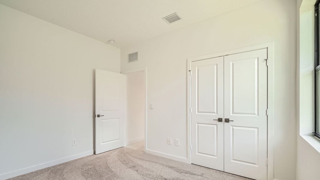 Representative unfurnished interior of a home built from the Delray by D.R. Horton in Twin Oaks, Stuart (Image 20).