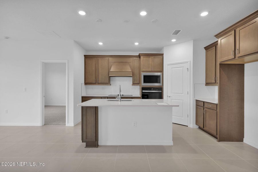 Furnished interior view inside a new home in Hyland Trail, Green Cove Springs (Image 6).