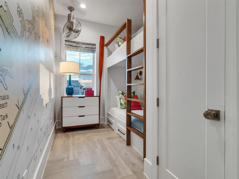 Designed for laughter, comfort, and connection, this bunk room is a coastal favorite. With custom-built bunks and playful Galveston-inspired wallpaper, it’s made for weekend guests, kids’ sleepovers, and carefree summer moments. Picture the joy of beach days that end with stories told from bunk to bunk — this is the kind of space where family memories are made and cherished. Designed for laughter, comfort, and connection, this bunk room is a coastal favorite. With custom-built bunks and playful Galveston-inspired wallpaper, it’s made for weekend guests, kids’ sleepovers, and carefree summer moments. Picture the joy of beach days that end with stories told from bunk to bunk — this is the kind of space where family memories are made and cherished.