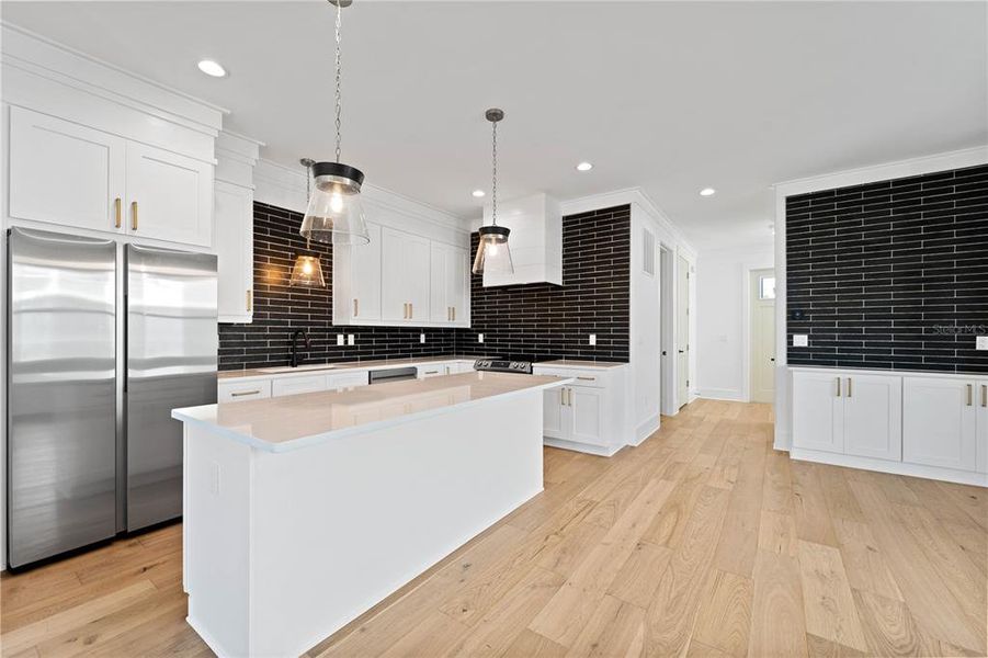 Kitchen/Dining with Built-in Storage. Grand Tile Backsplash That Goes to the Ceiling!