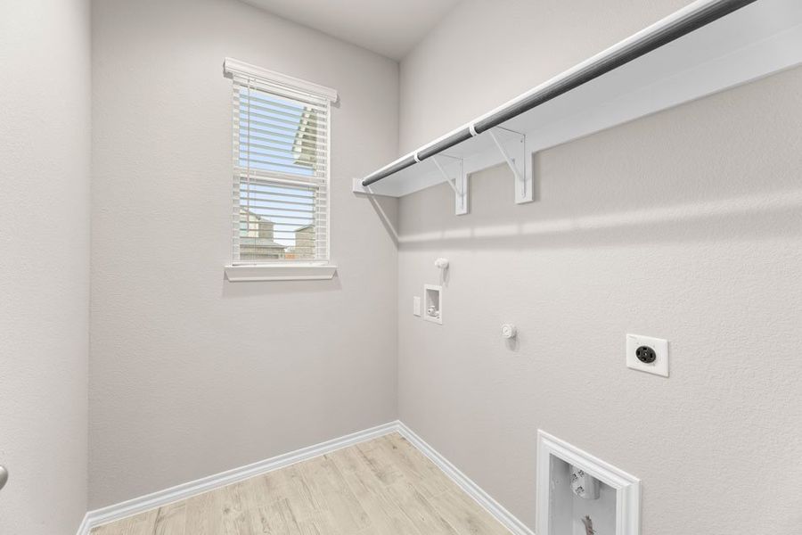 Representative exterior photo of a completed home built from the Willow by Impression Homes in Creekside Ranch, Blue Ridge, TX (Image 23).