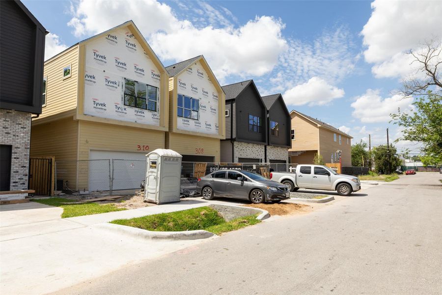 Front exterior of a new home in , Houston, TX, highlighting curb appeal (Image 26).