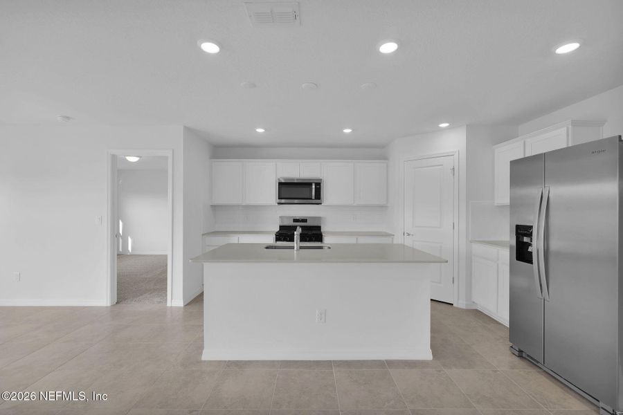 Furnished interior view inside a new home in Wells Landing, Jacksonville (Image 4).