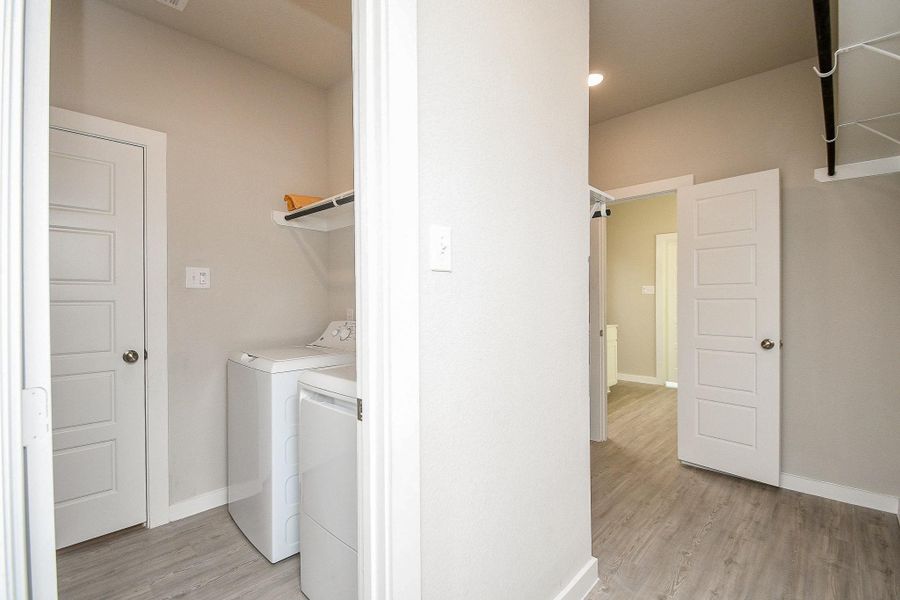 Furnished interior view inside a new home in Marvida, Cypress (Image 13).