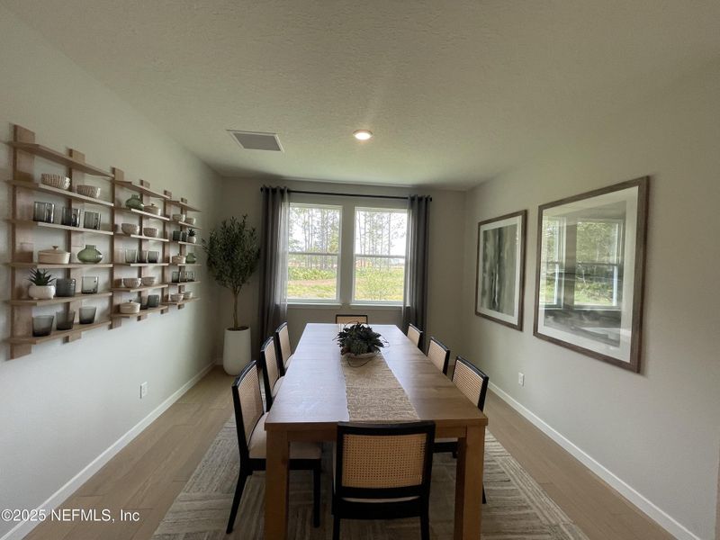 Furnished interior view inside a new home in The Cypress Series at Reserve East, Flagler Beach (Image 9). Furnished interior view inside a new home in The Cypress Series at Reserve East, Flagler Beach (Image 9).