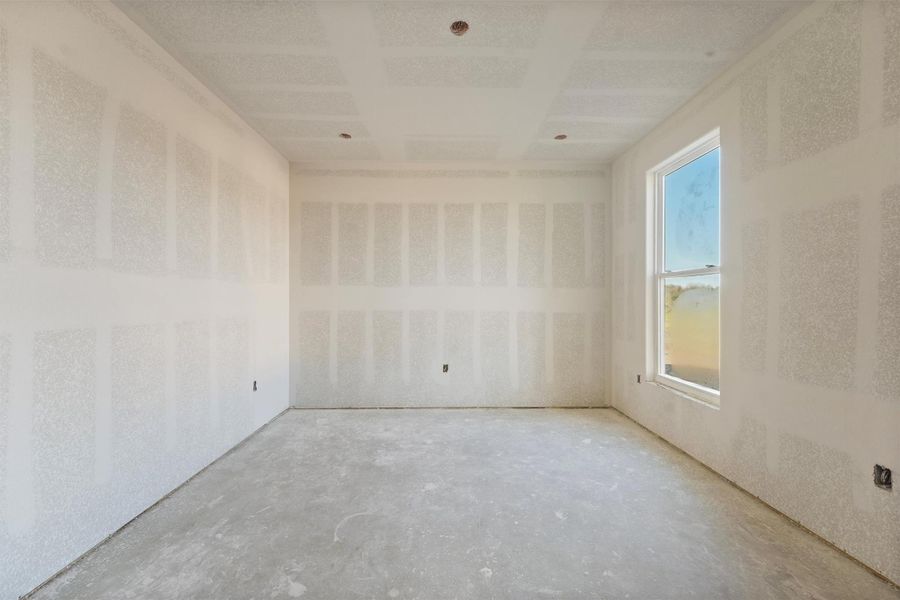 Another secondary bedroom with expansive windows showcasing stunning views. Another secondary bedroom with expansive windows showcasing stunning views.