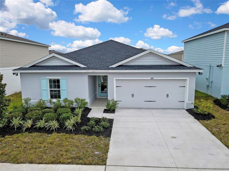 Front exterior of a new home in , Sumterville, FL, highlighting curb appeal (Image 28).