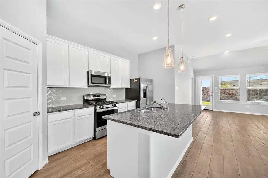 Furnished interior view inside a new home in Mobberly Farms, Pilot Point (Image 9). Furnished interior view inside a new home in Mobberly Farms, Pilot Point (Image 9).