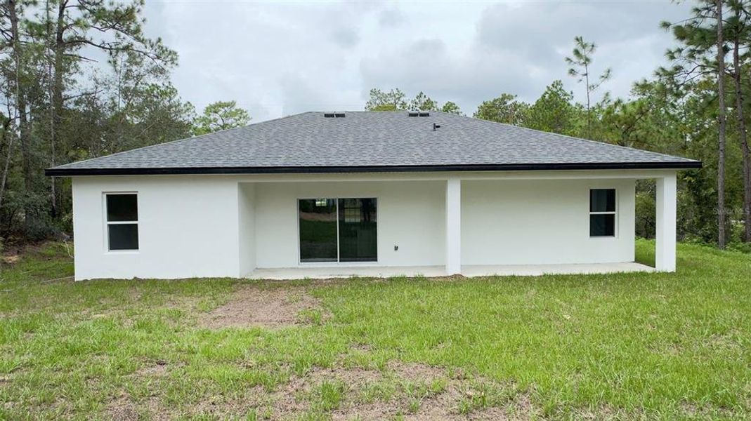 Front exterior of a new home in , Citrus Springs, FL, highlighting curb appeal (Image 2).