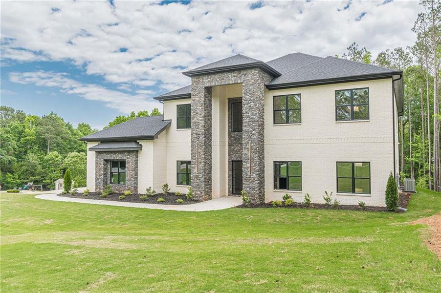 Front exterior of a new home in , McDonough, GA, highlighting curb appeal (Image 30).