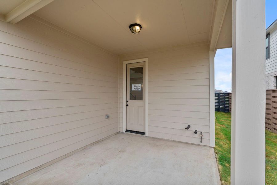 Exterior details and patio area of a home in Austin Point, Richmond (Image 4).
