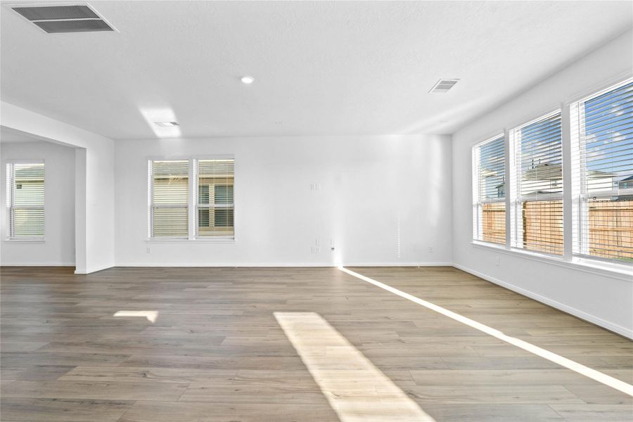 Additional view of the Great Room from the kitchen showcasing all the natural light pouring into this grand space. Additional view of the Great Room from the kitchen showcasing all the natural light pouring into this grand space.