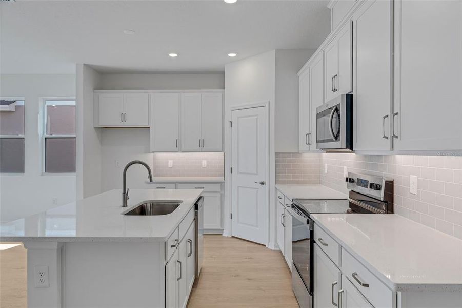Furnished interior view inside a new home in Seaire, Parrish (Image 16).