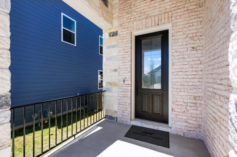 Exterior details and patio area of a home in Cannon Ranch, Dripping Springs (Image 3).