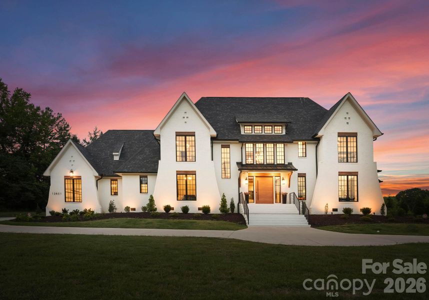 Front exterior of a new home in , Davidson, NC, highlighting curb appeal (Image 1). Front exterior of a new home in , Davidson, NC, highlighting curb appeal (Image 1).