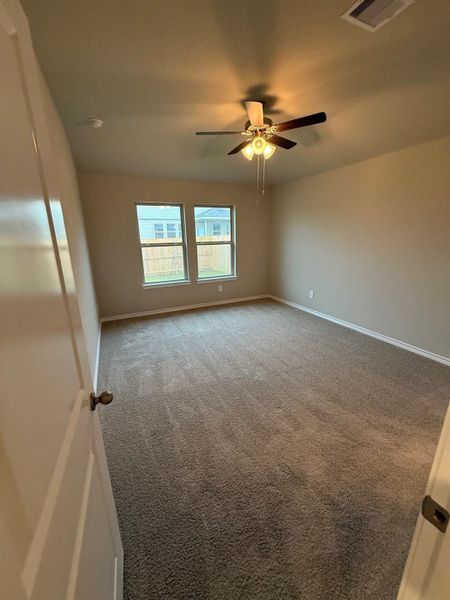 Spacious, unfurnished interior of a new home in Southern Pointe, College Station (Image 7).