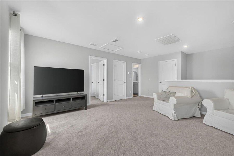 Furnished interior view inside a new home in Sanctuary Cove at Cane Bay, Summerville (Image 6).