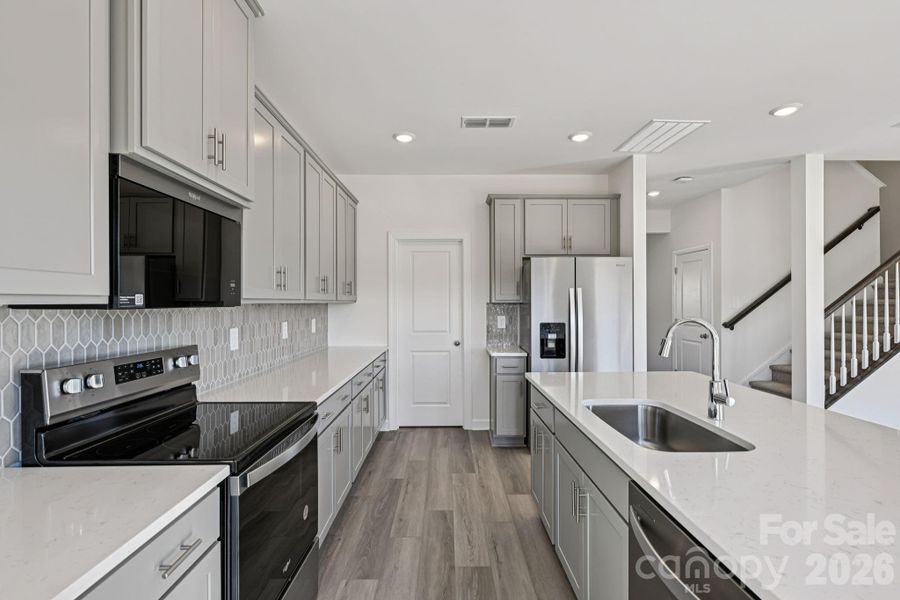 Photo is not of the actual home, but is an inspirational photo of builder’s model home and may depict options, furnishings, and/or decorator features that are not included