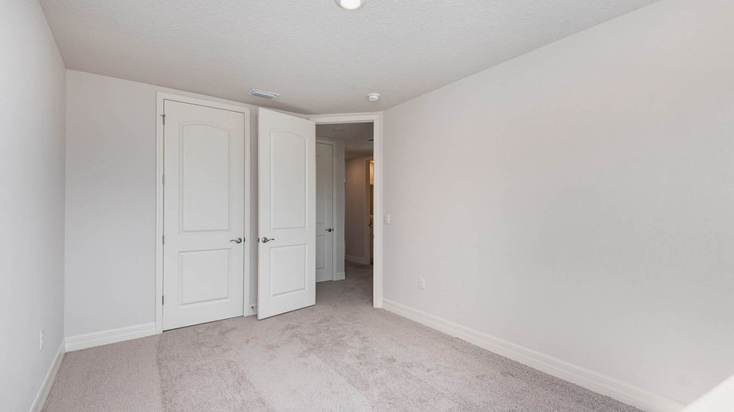 Representative unfurnished interior of a home built from the Jordyn II by D.R. Horton in Riverwalk of Cocoa, Cocoa (Image 14).
