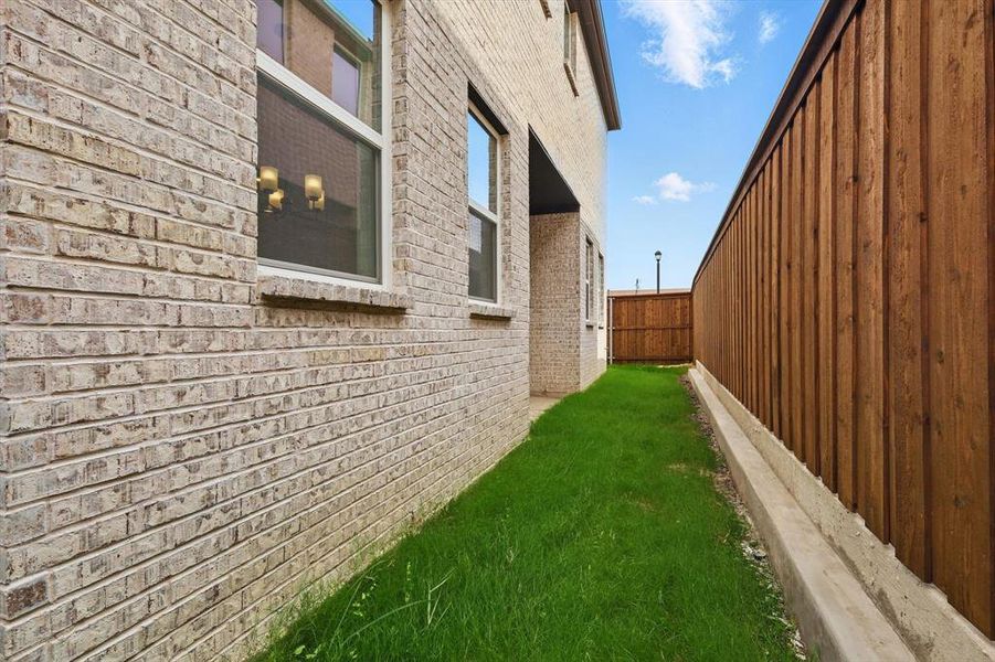 View of home's exterior with brick siding