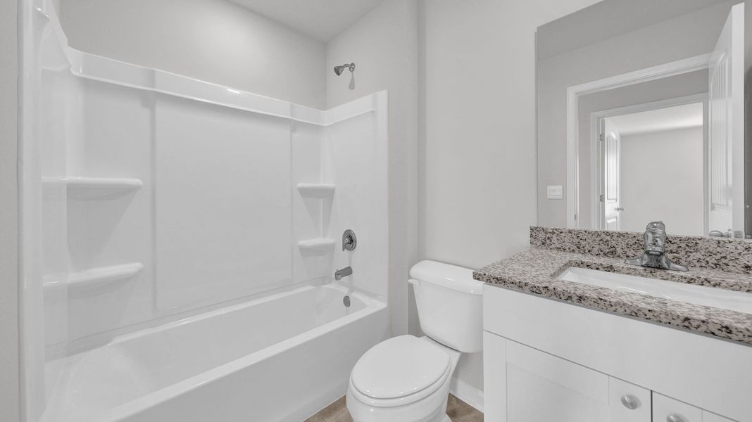 Representative furnished interior of a home built from the ASPEN by D.R. Horton in Morford, Jackson (Image 13).